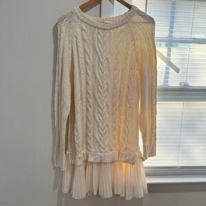 Women’s Cream Cable Knit Sweater with Ruffled Hem
